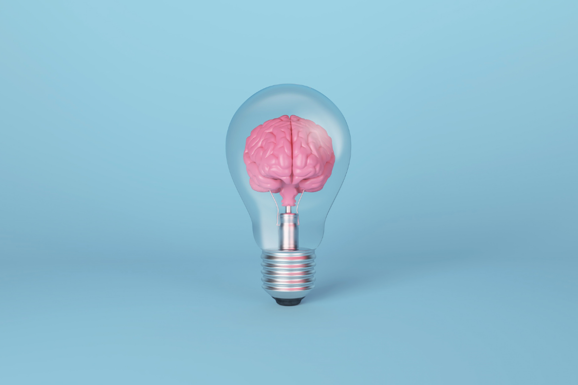 Brain in a light bulb with a blue background